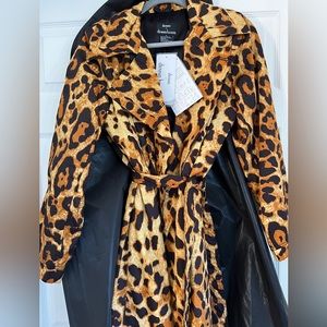 Brand new with tags! Leopard double breasted trench coat! Stunning! Dennis basso